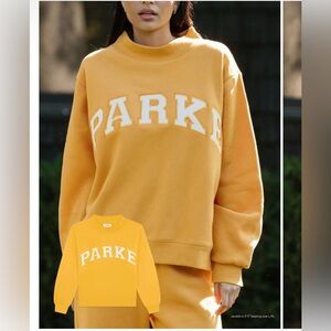 Brand new Parke yellow mockneck size L/XL